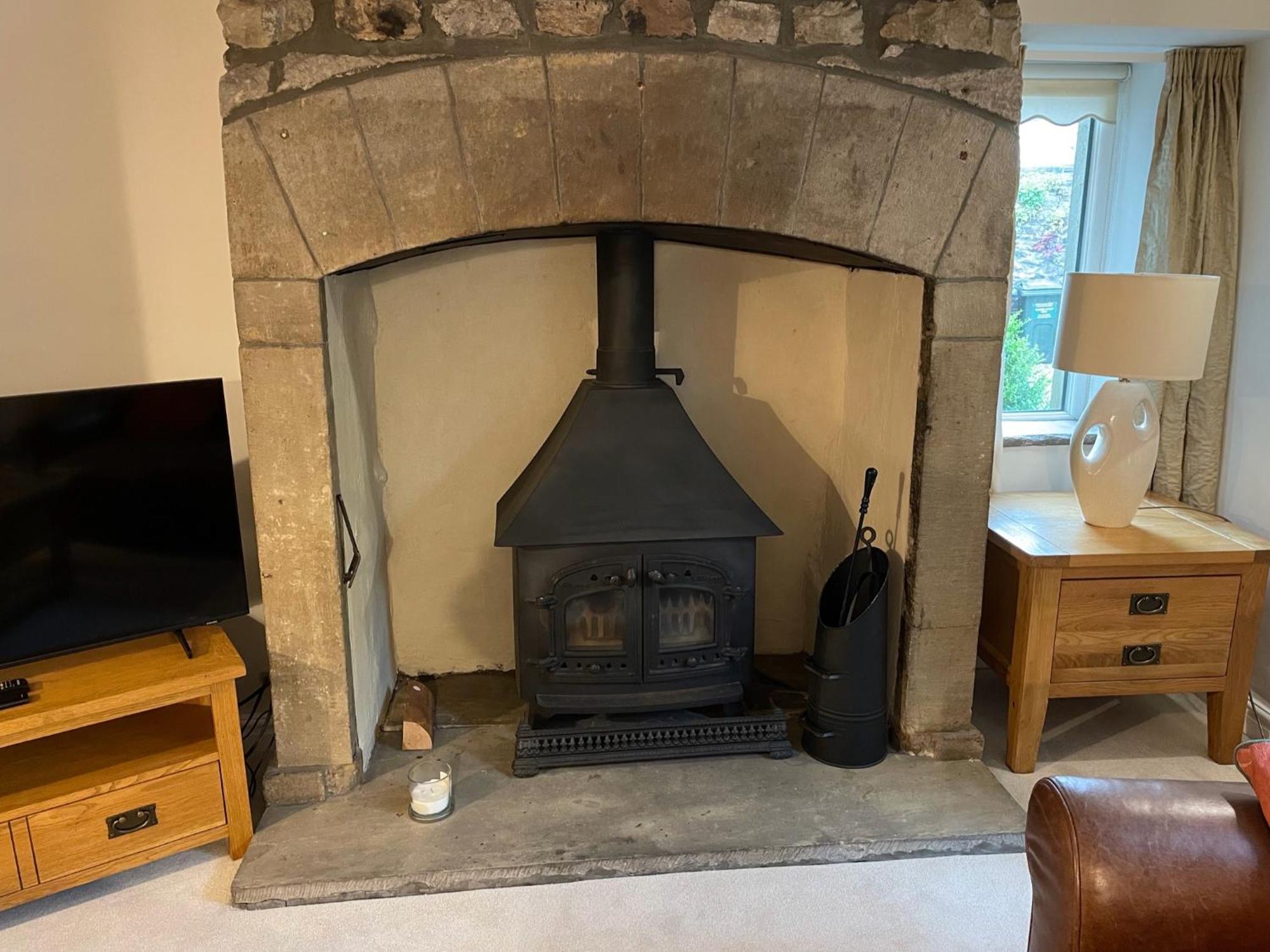 Ashfield House Hotel Grassington Room photo The fireplace in the living room